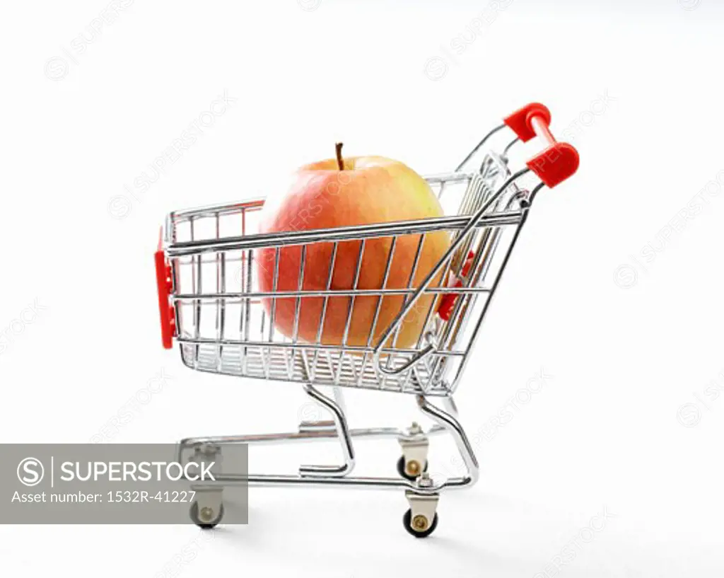 Apple in toy shopping trolley