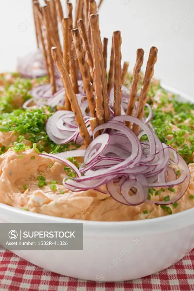 Obatzda (cheese spread) with onions, chives, salted sticks