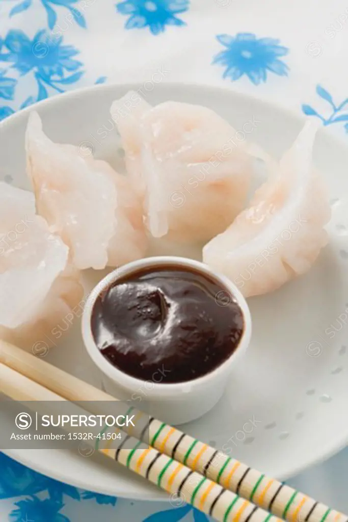 Dim sum with dip on plate (Asia)
