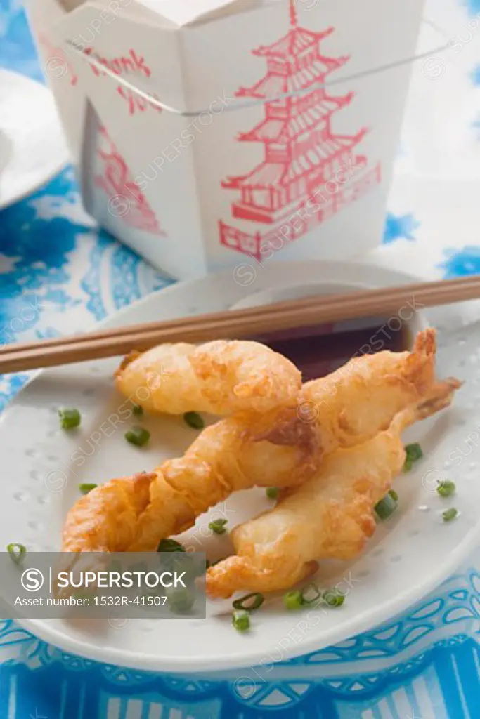 Deep-fried prawns in batter with soy sauce to take away (Asia)