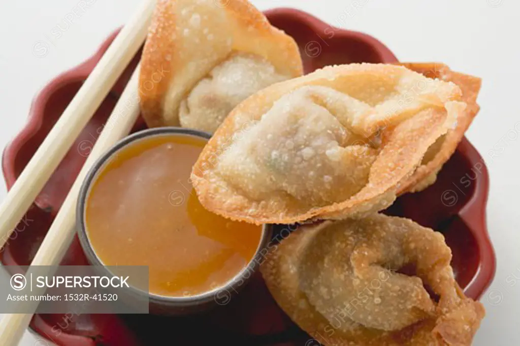 Deep-fried dim sum with sweet & sour sauce (Asia)