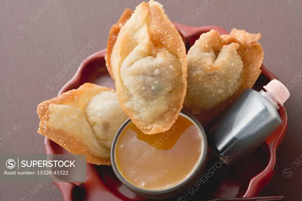 Deep-fried dim sum with two sauces (Asia)
