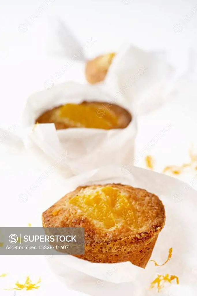 Orange muffins wrapped in paper