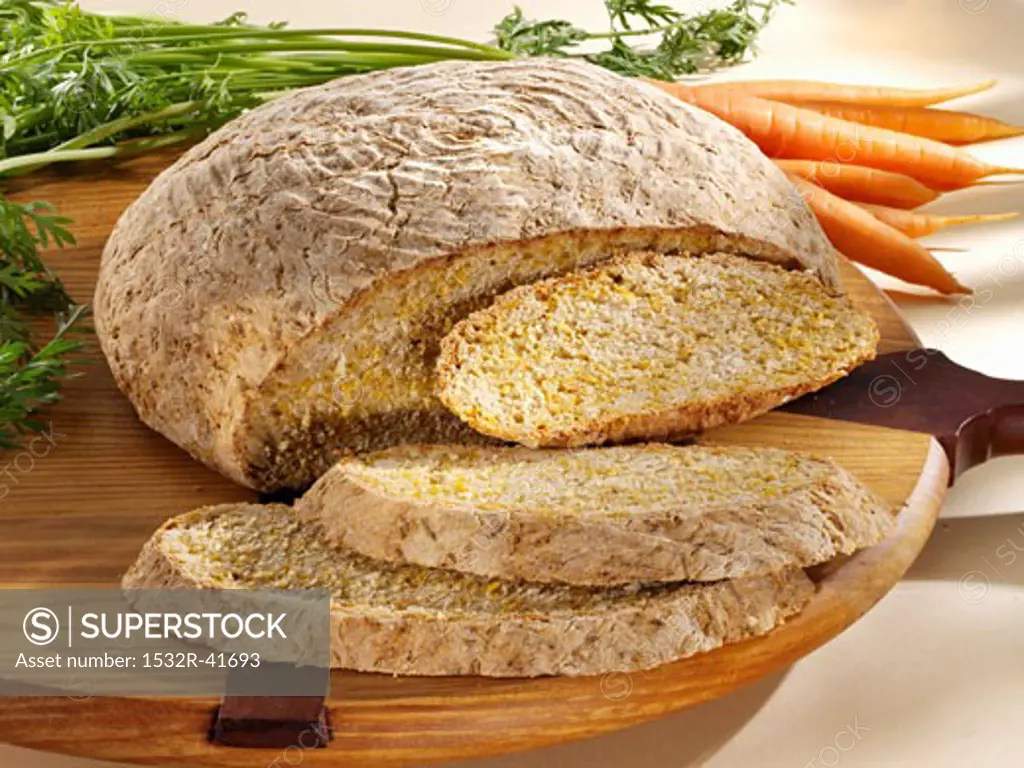 Carrot and sesame bread, partly sliced
