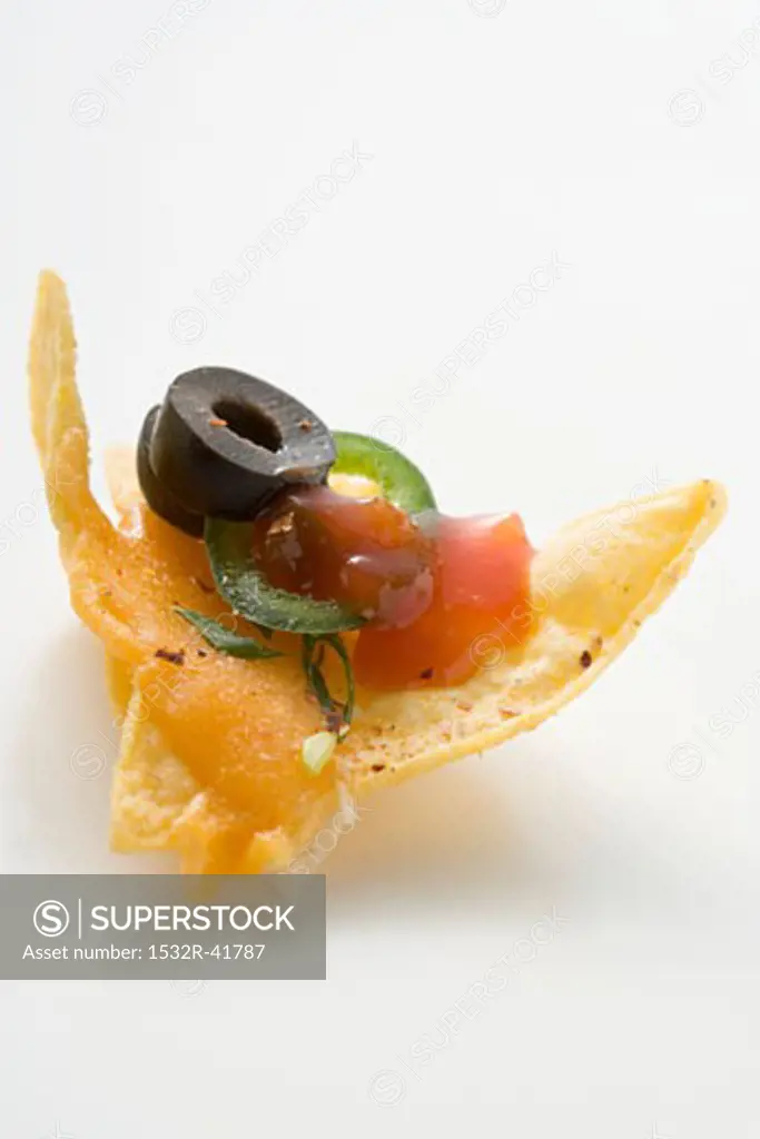 Nacho with cheese, olive, chilli ring and ketchup