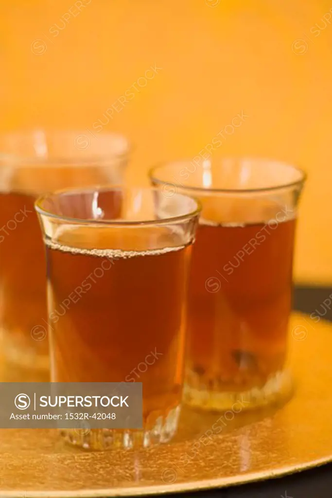 Three glasses of black tea