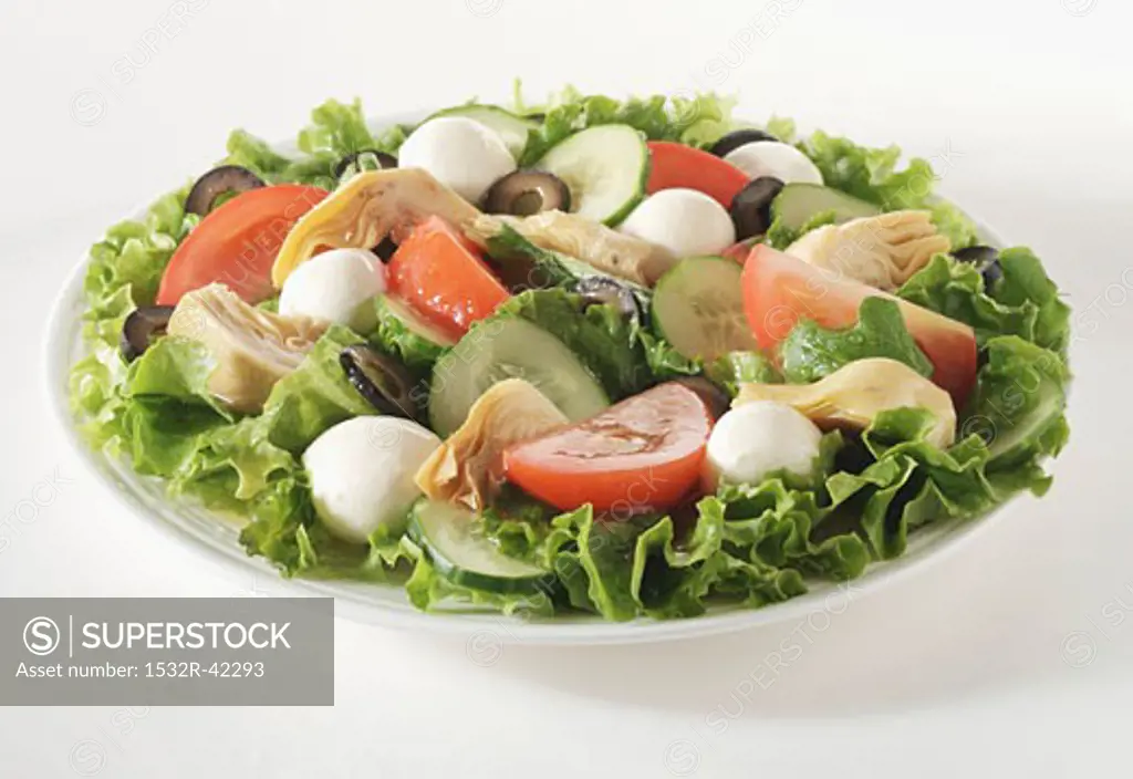 Salad with Artichokes, Mozzarella, Tomato and Cucumbers