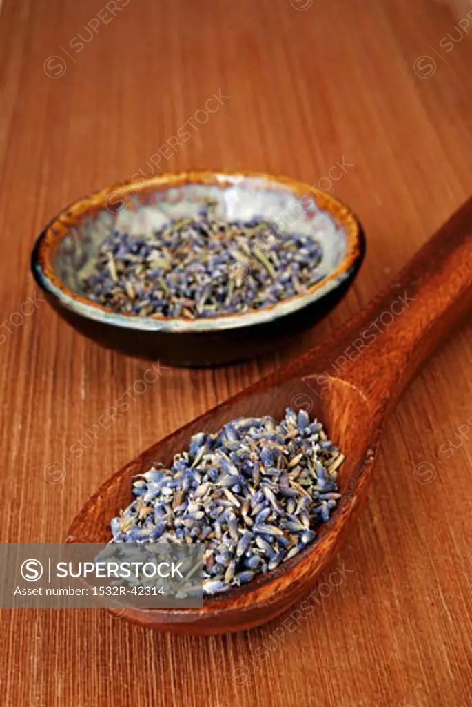 Dried Lavender Blossoms in a Wooden Spoon and Bowl