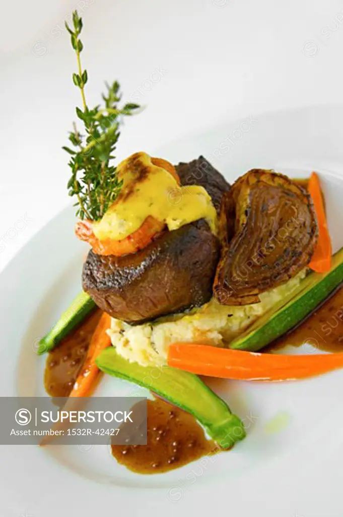 Steak Jolene: Beef Fillet with Prawn and Herb Infused Mashed Potato and Mustard Port Demi-Glace