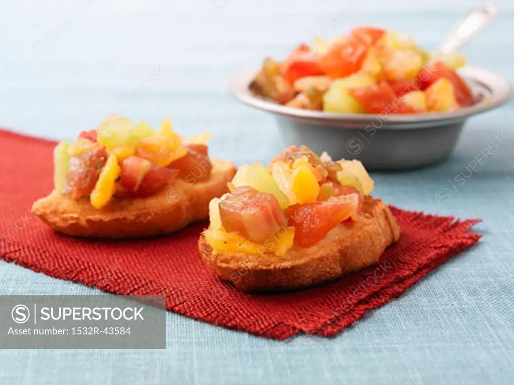 Bruschetta topped with brandy tomatoes
