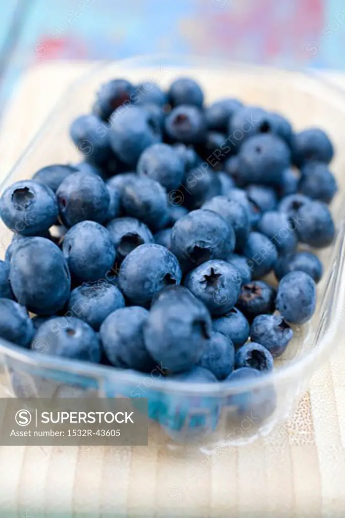 Fresh blueberries in a plastic punnet