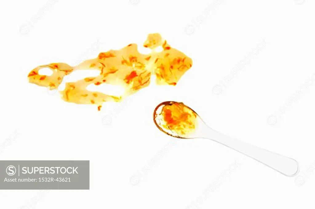 Orange marmalade with spoon