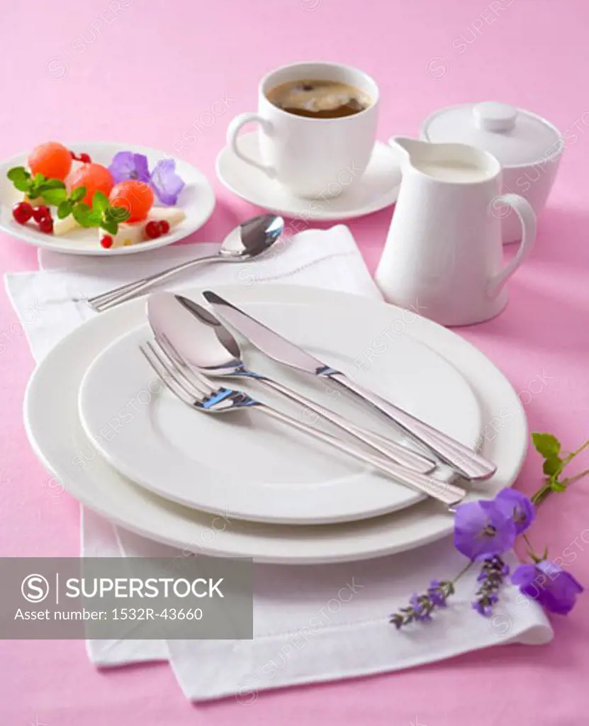 White place-setting with coffee