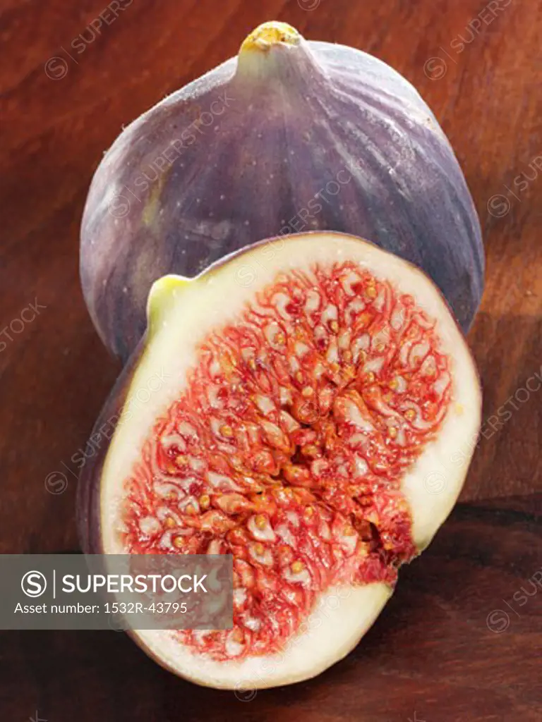 Half a fig in front of a whole fig