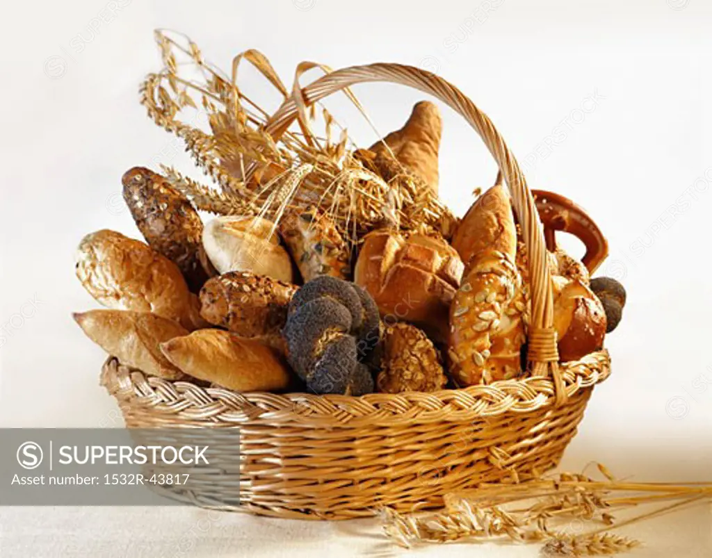 Assorted bread rolls, breads & cereal ears in bread basket