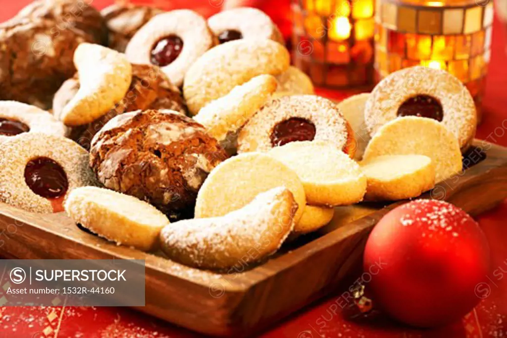 Assorted biscuits in a wooden tray