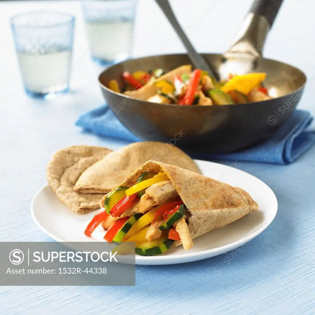 Pita bread filled with chicken and vegetables