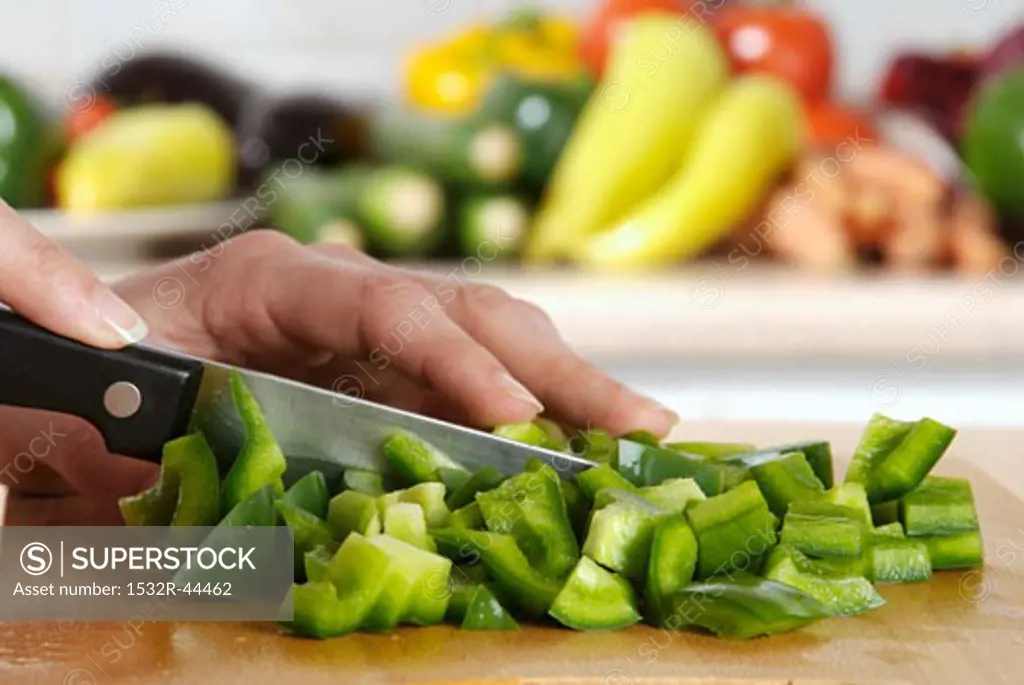 Chopping a green pepper