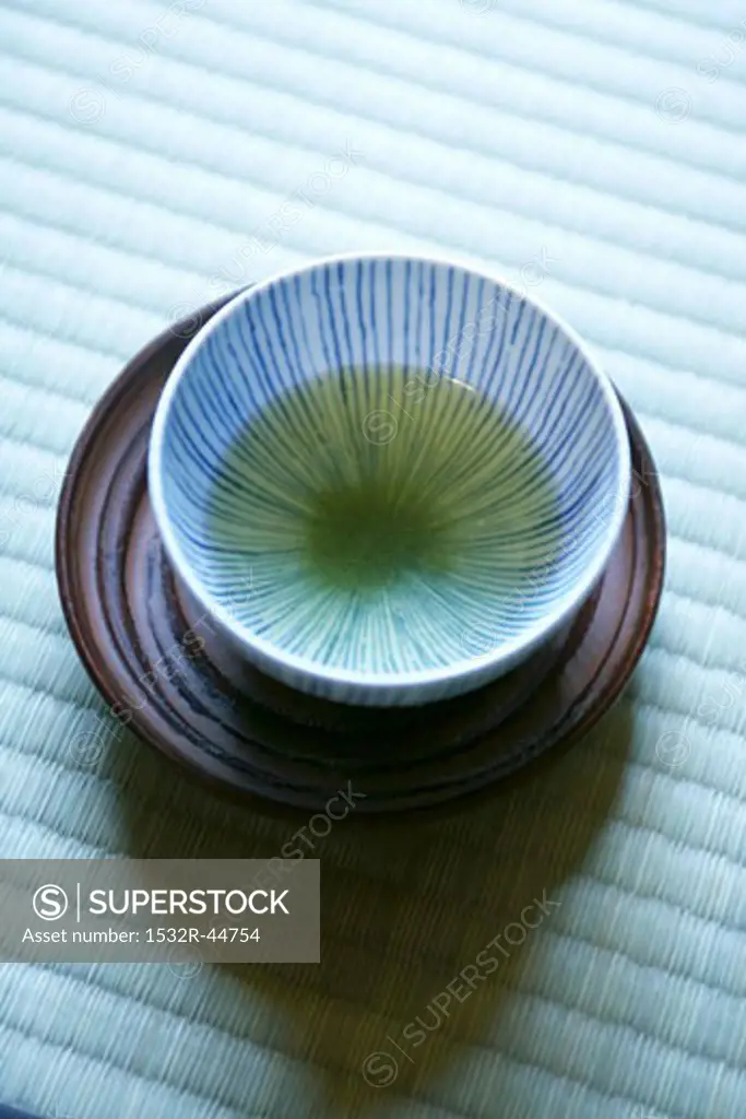 Bowl of green Matcha tea