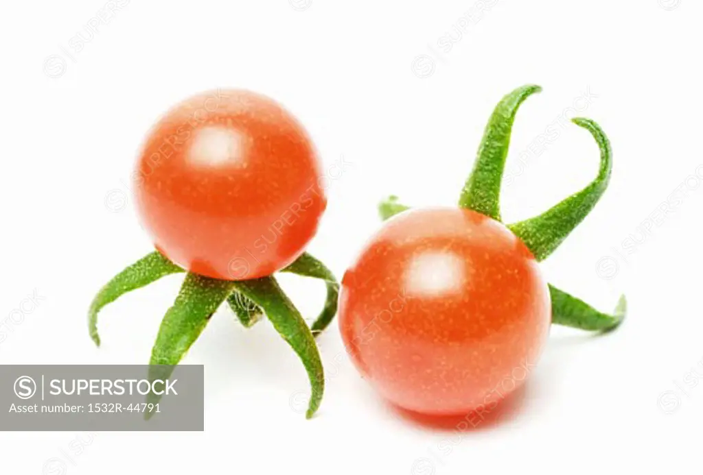 Two cocktail tomatoes