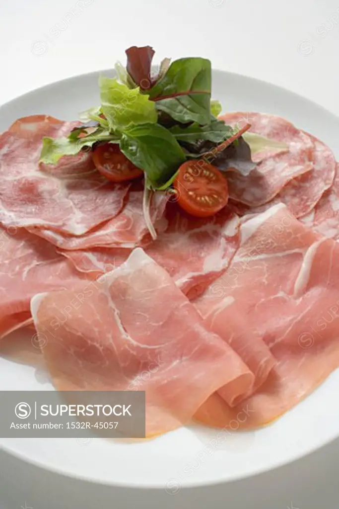Sausage platter with raw ham and salami