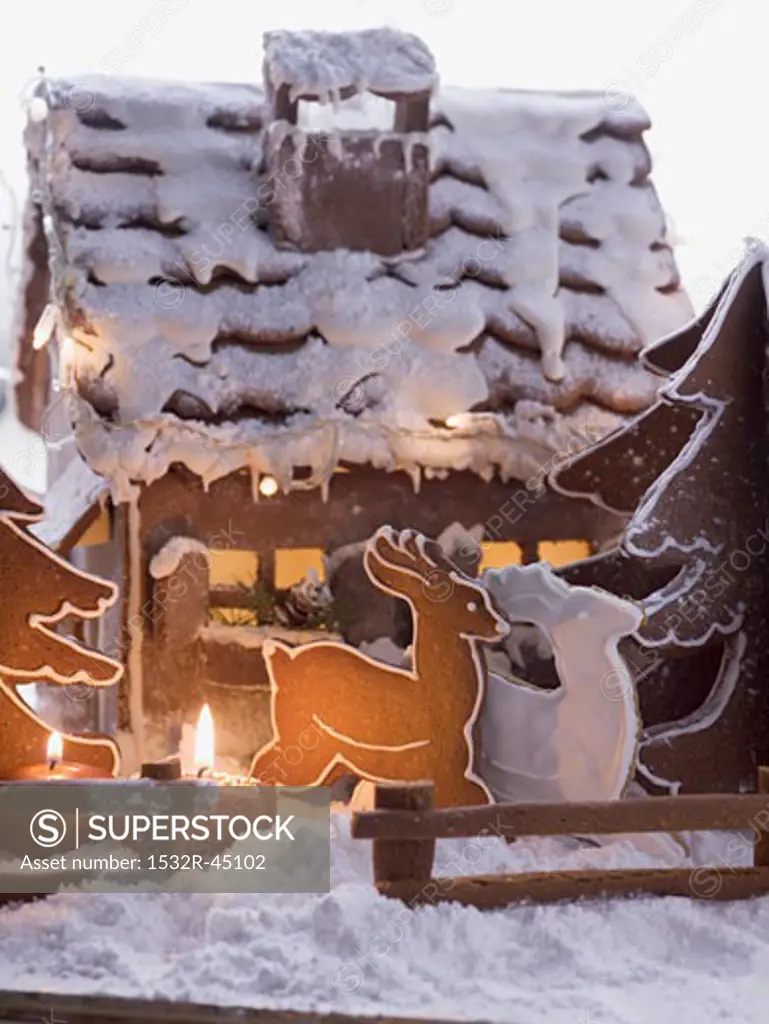 Gingerbread house with gingerbread reindeer