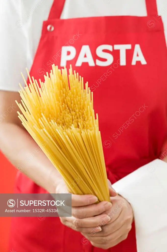 Woman holding spaghetti