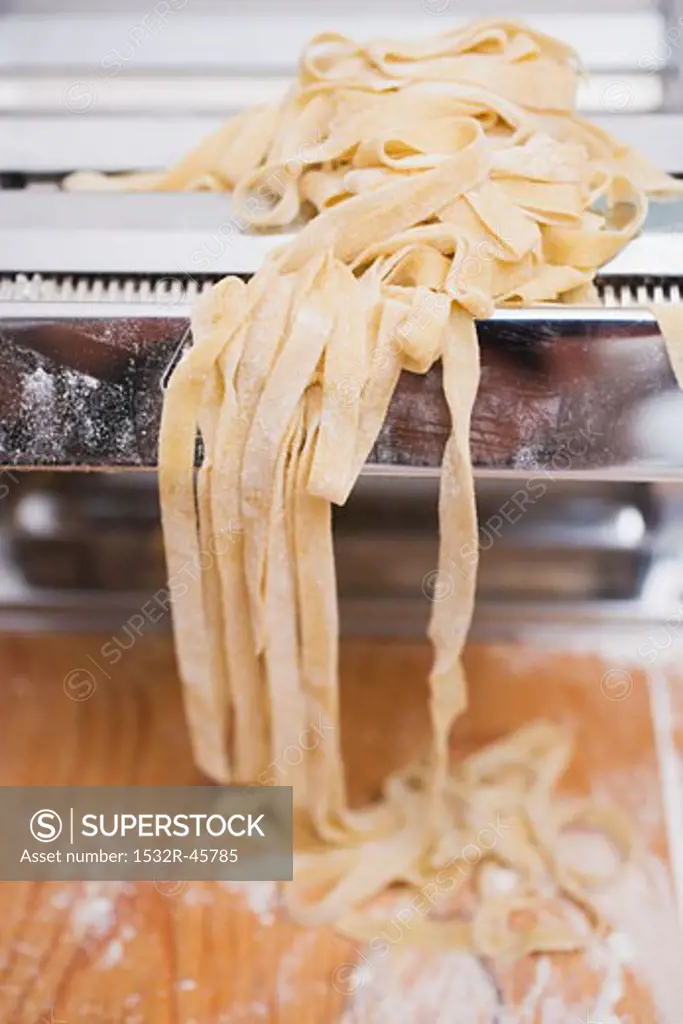 Home-made ribbon pasta on pasta maker