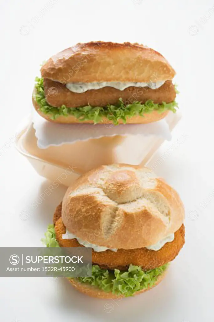 Two schnitzel rolls with remoulade and lettuce