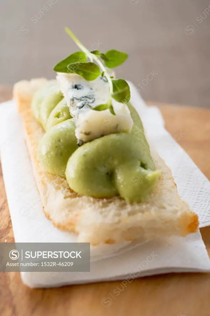 Bruschetta with avocado spread and blue cheese