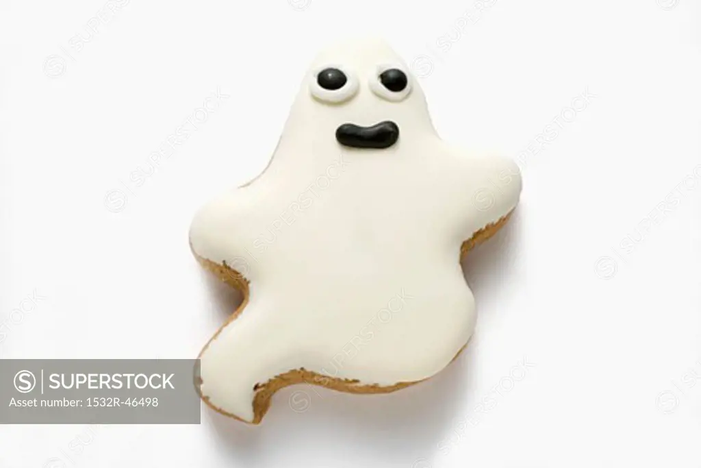 A ghost biscuit with white icing for Halloween