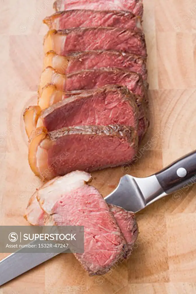 Beef steak with fatty edge, sliced