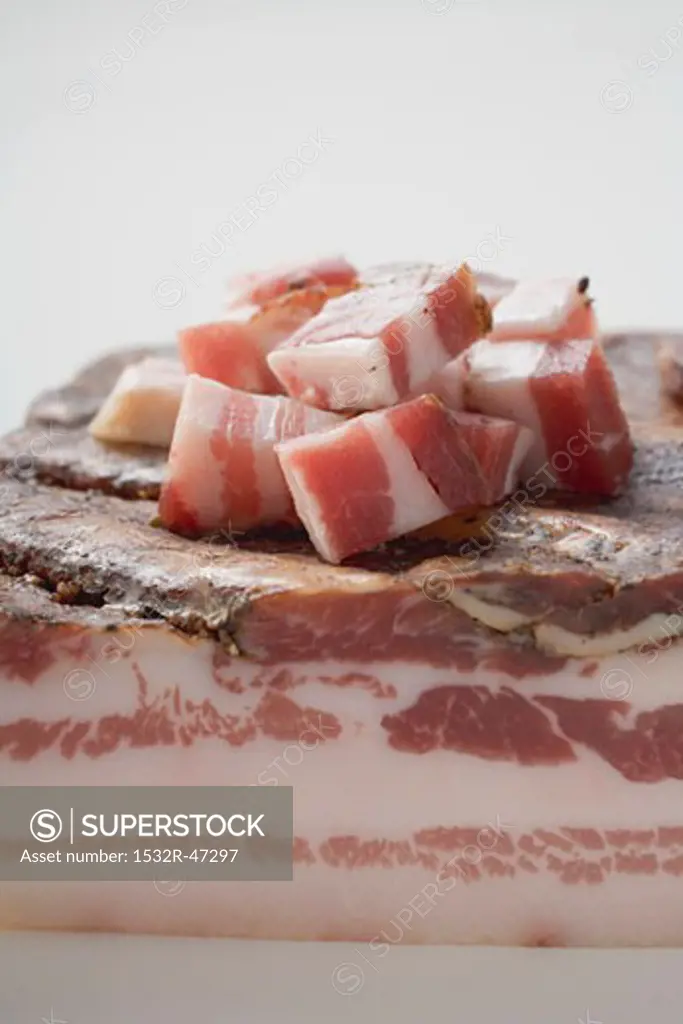 Piece of bacon and diced bacon