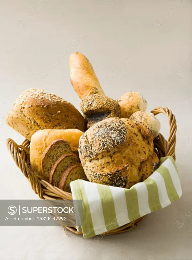 Assorted breads and bread rolls in bread basket
