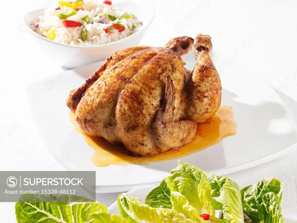 Whole roast chicken, vegetable rice and green salad