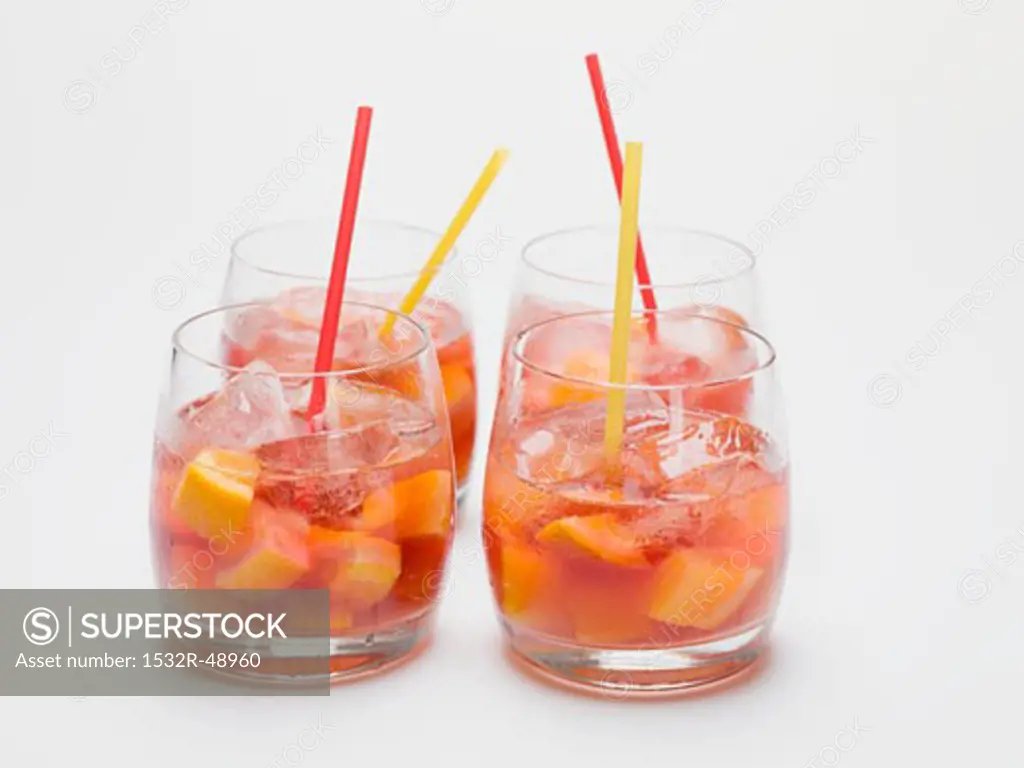 Fruity red wine punch in four glasses