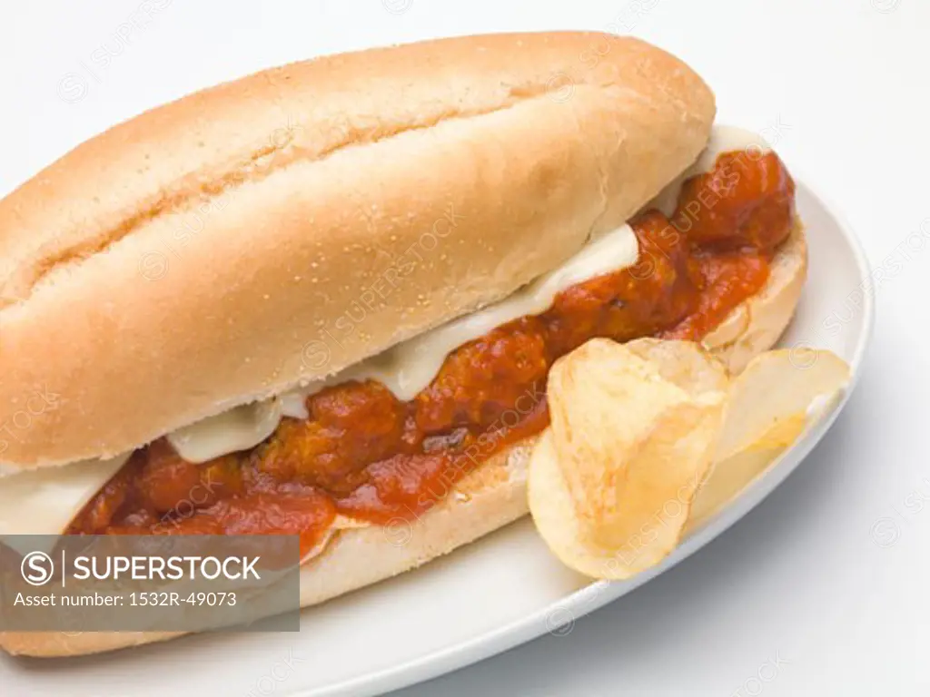 Meatball sub sandwich with tomato sauce and cheese, crisps
