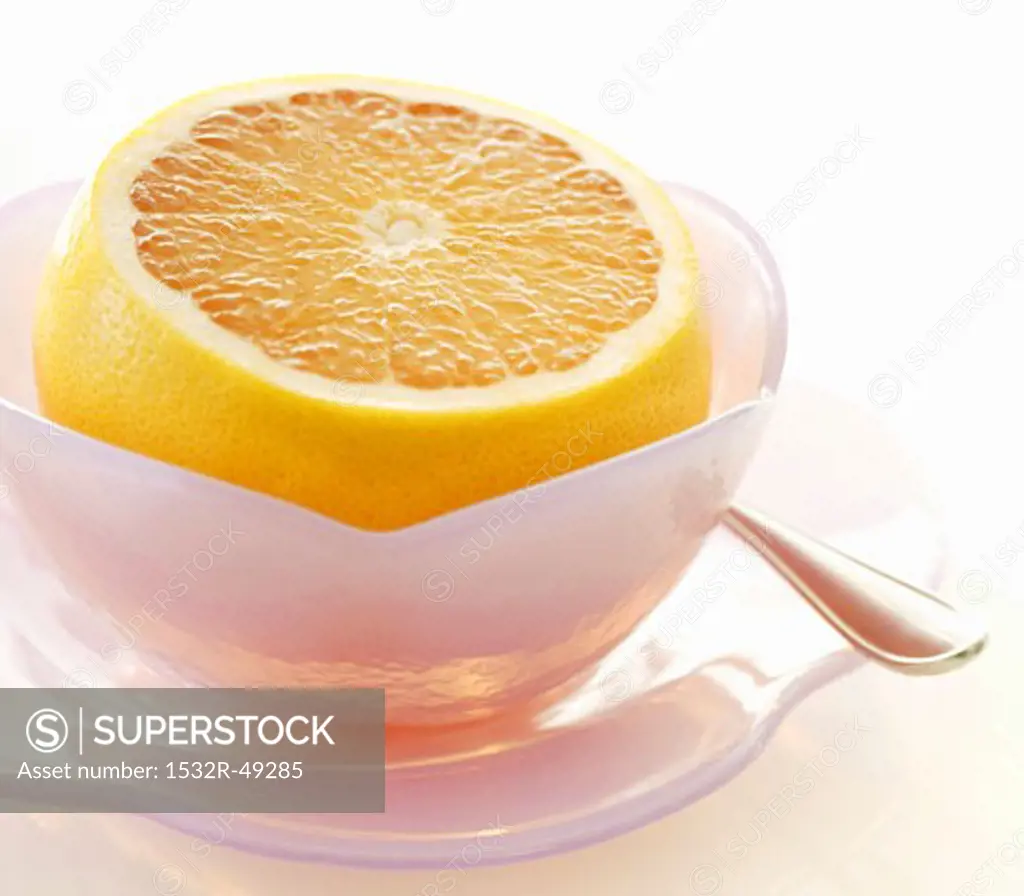 Grapefruit with Top Cut Off in a Purple Bowl