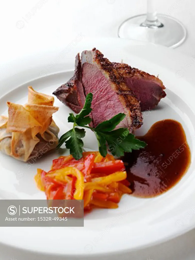 Sliced Duck Breast with Dumpling and Peppers