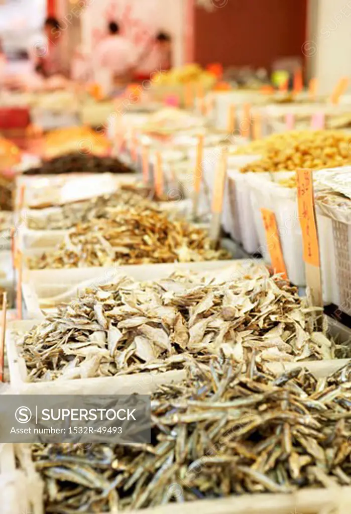 Dried fish etc. on market stalls (Chinatown in Vancouver)