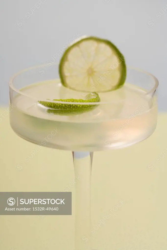 Caipirinha with lime in glass