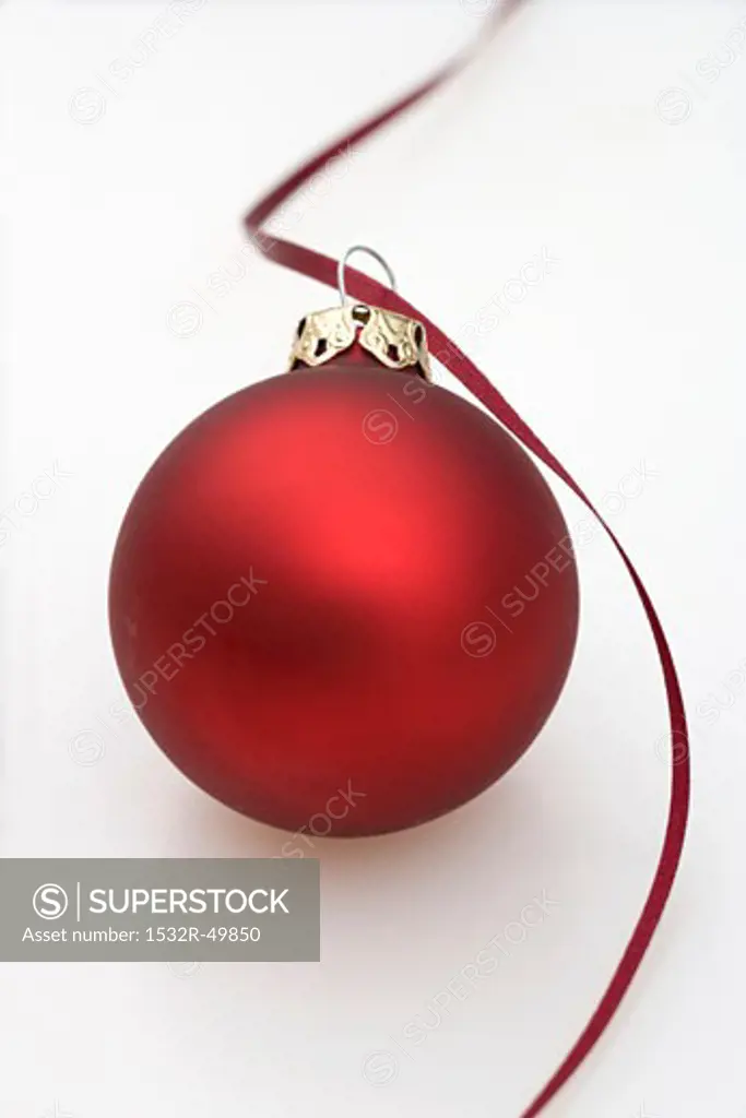 Red Christmas bauble with ribbon