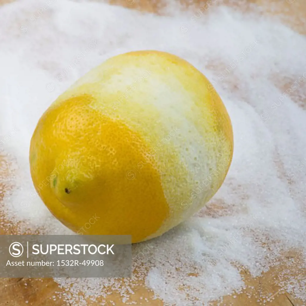 Peeled lemon on sugar