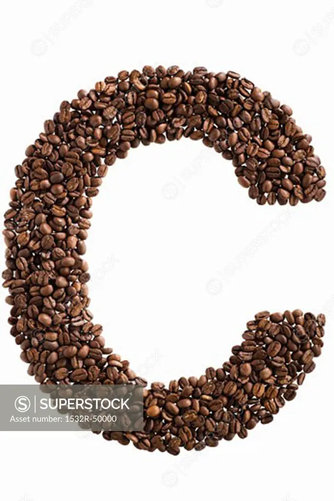 The letter C written in coffee beans