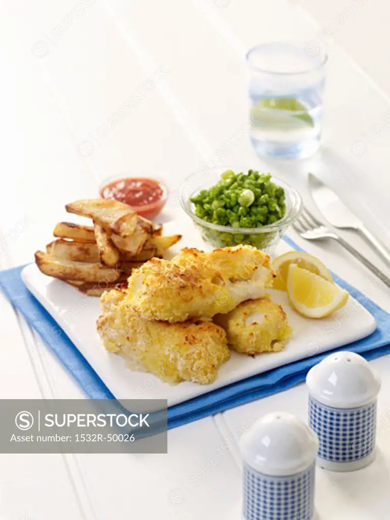 Breaded haddock with chips and peas