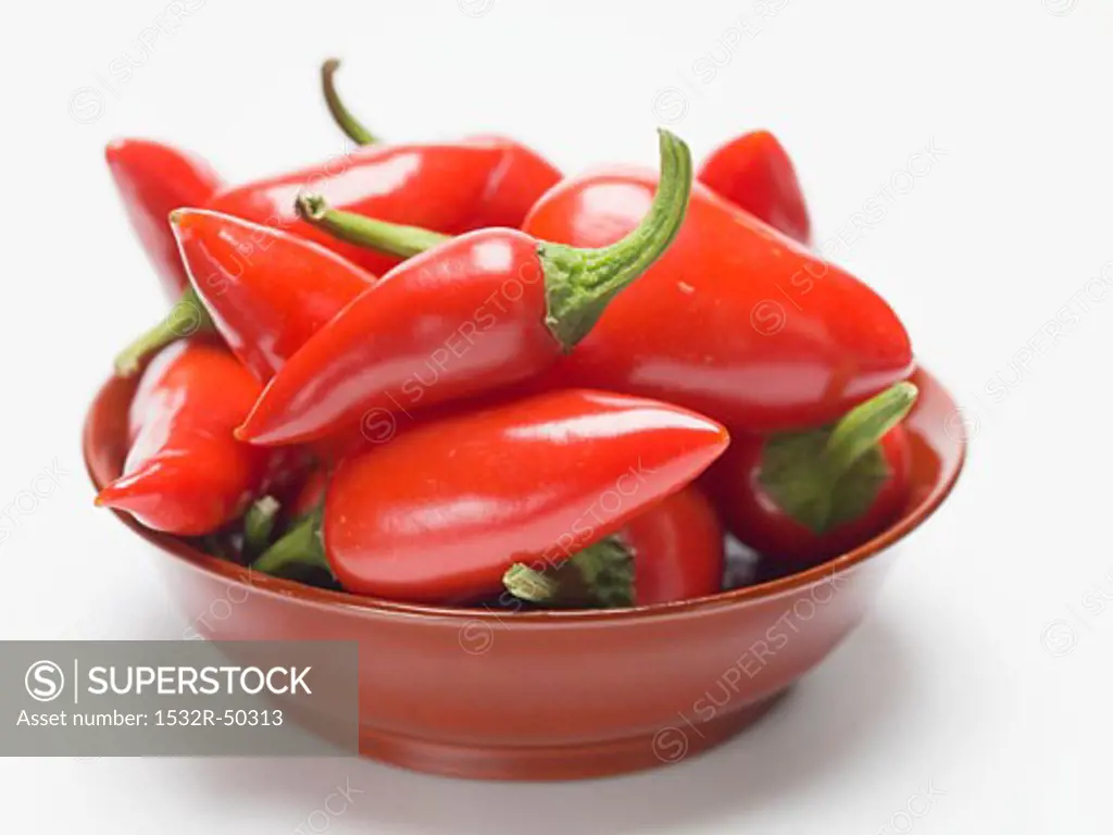 Red chillies in a red dish