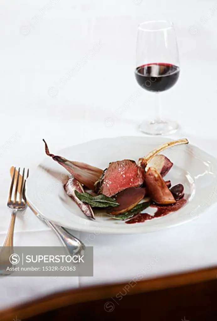 Rack of venison with apple and root vegetables
