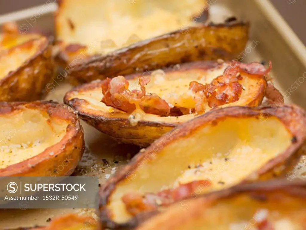 Baked potato skins with bacon (close-up)