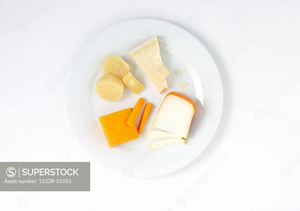 Various cheeses on plate (overhead view)
