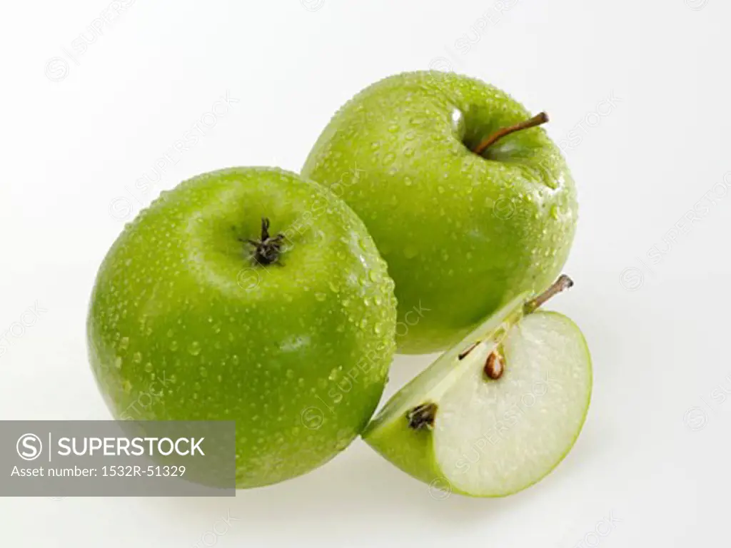 Granny Smith apples with drops of water